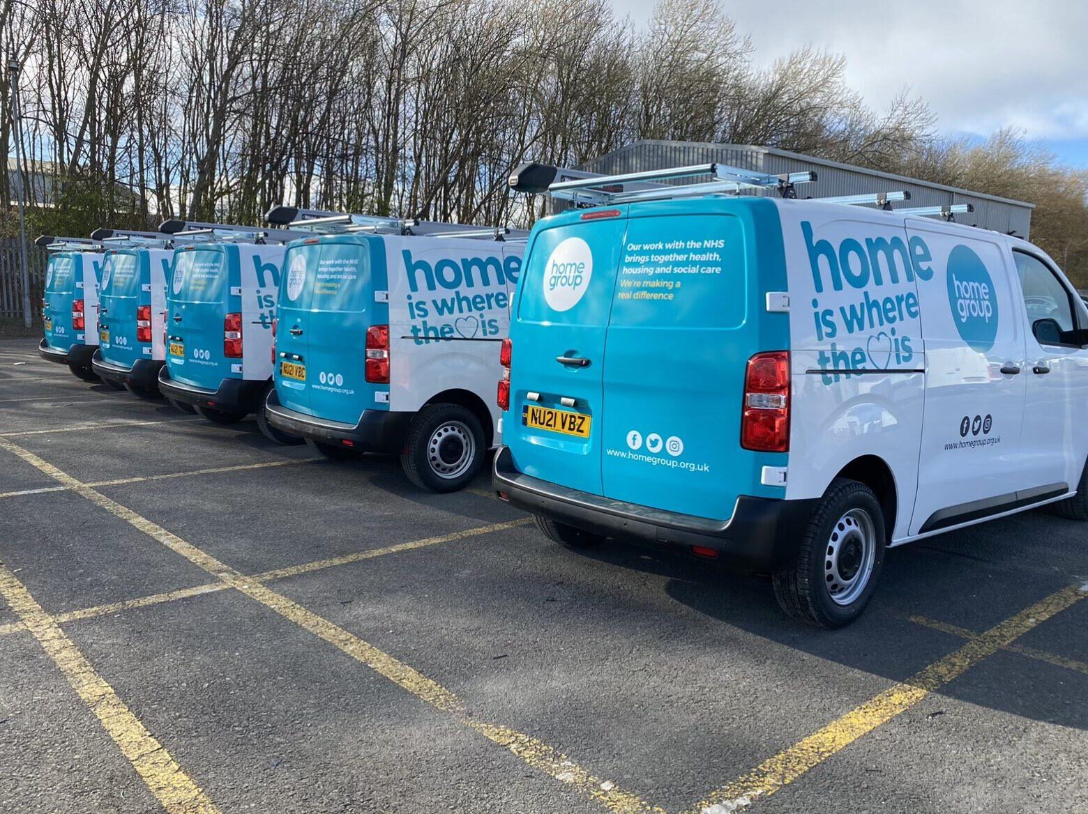 Vehicle Graphics 5 home group branded vehciles lined up